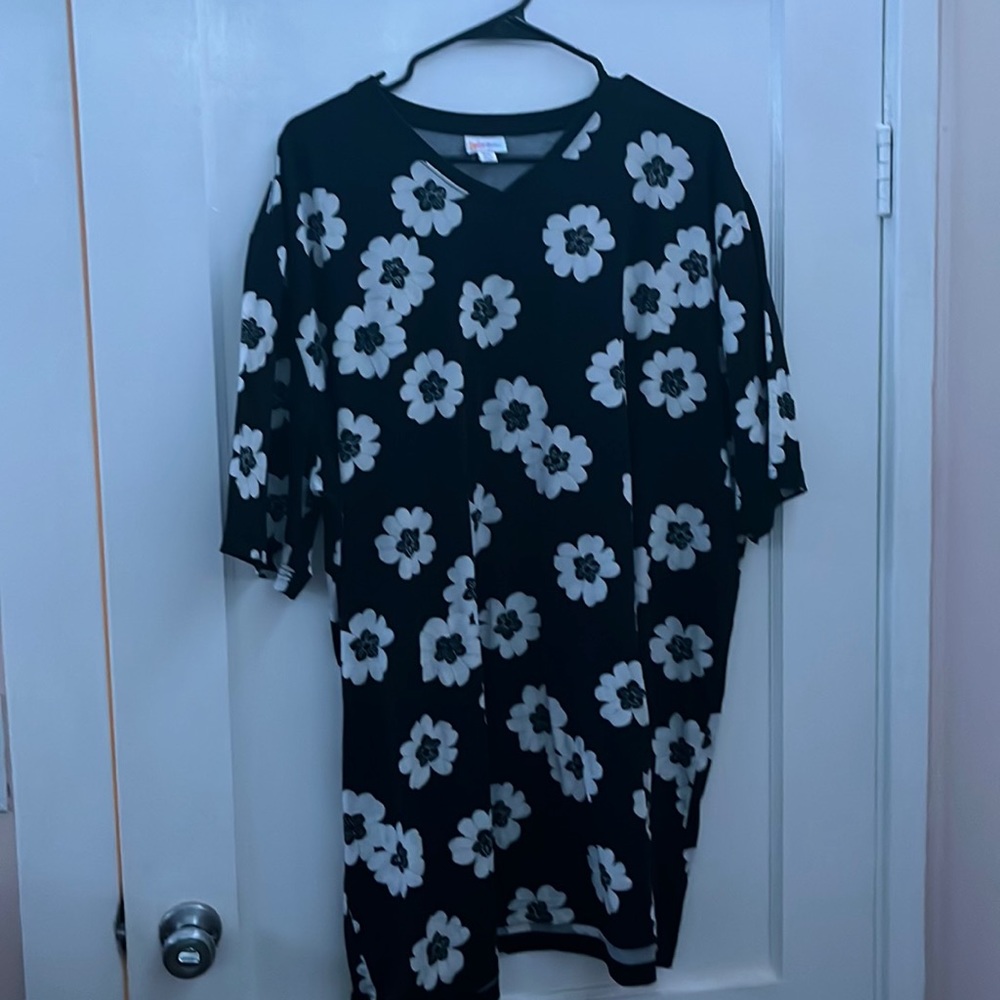 Black shirt with white and black flowers